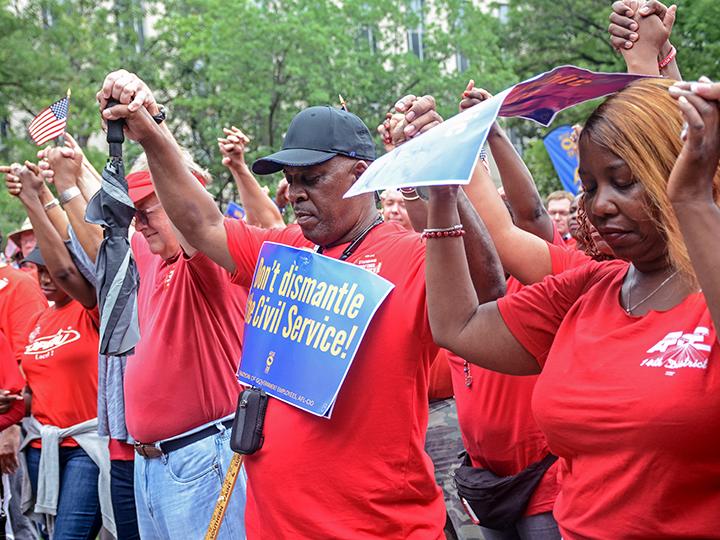 AFGE members go #RedForFeds in Washington, D.C., to protest Trump’s union-busting.