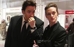 John Cusack and Joan Cusack in the antiwar satire War, Inc.