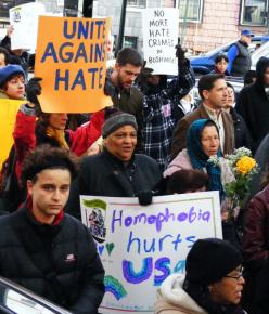 Protesters march in memory of Jose Sucuzhanay who was killed by men shouting racist and homophobic slurs