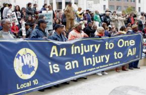 Members of International Longshore and Warehouse Union Local 10 at an Oakland rally calling for justice for Oscar Grant