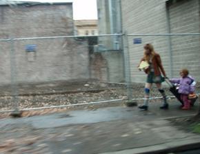 A single mother walks with her daughter