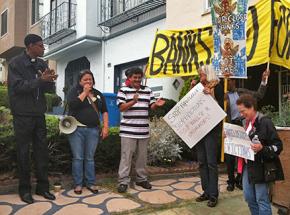 Dozens of supporters gathered to help Alcides Perla re-occupy his home