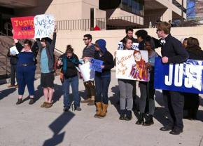 Suuprters outside the court house call for justice for Ayyub