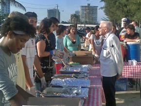 Members of Love Thy Neighbor distribute food in Broward County, Florida