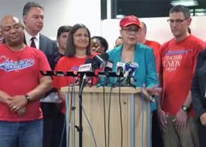 CTU President Karen Lewis (at lectern) announces a tentative contract agreement