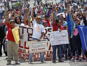 Central American migrants traveling north build solidarity in Mexico City