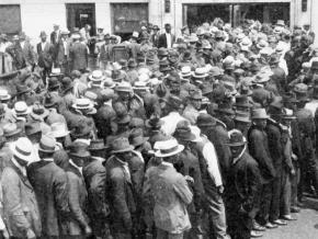 African American stockyard workers line up for emergency wages during the Chicago Race Riot of 1919