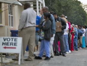 Voters wait in line to cast their ballots in Florida