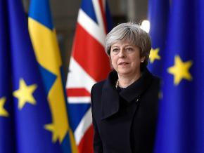 British Prime Minister Theresa May attends a negotiating meeting on Brexit