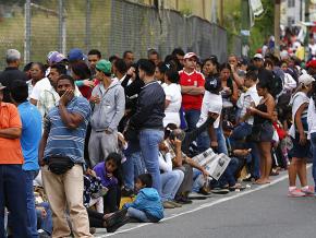 Waiting in line for basic supplies in Caracas