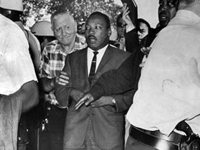 Martin Luther King marches into Chicago’s Marquette Park, shortly before he was struck by debris thrown by counterdemonstrators